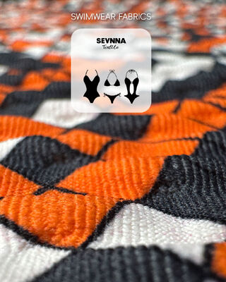 UPF 50+ सूर्य संरक्षण और 95% पुनर्नवीनीकरण नायलॉन के साथ उच्च रंग स्थिरता बनावट तैराकी कपड़े