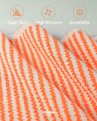 95% पुनर्नवीनीकरण पॉलिएस्टर + 5% स्पैन्डेक्स, 280gsm वजन और स्विमवियर के लिए उच्च सांस लेने की क्षमता के साथ प्रीमियम टेक्सचर्ड स्विम फैब्रिक